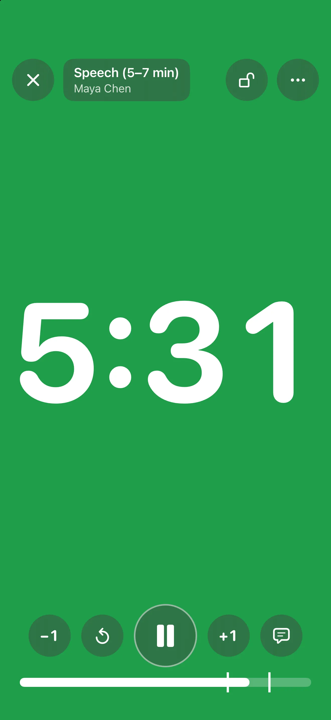 Full-screen green stage timer counting down a talk.